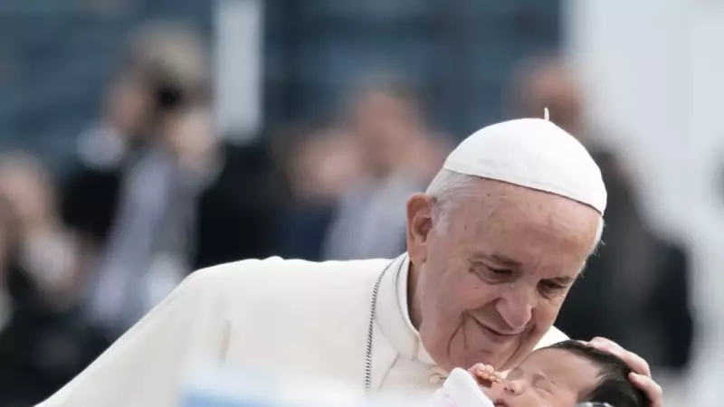 Pope covid act of love child